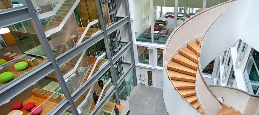 Inside the Informatics forum with a modern architectural design and spiral staircase